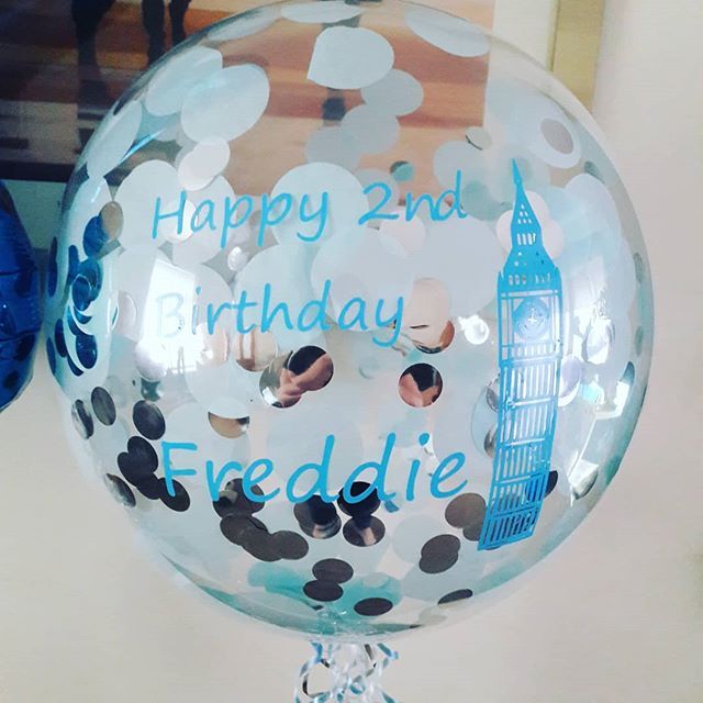 Personalised balloon with Confetti inside and light blue vinyl lettering