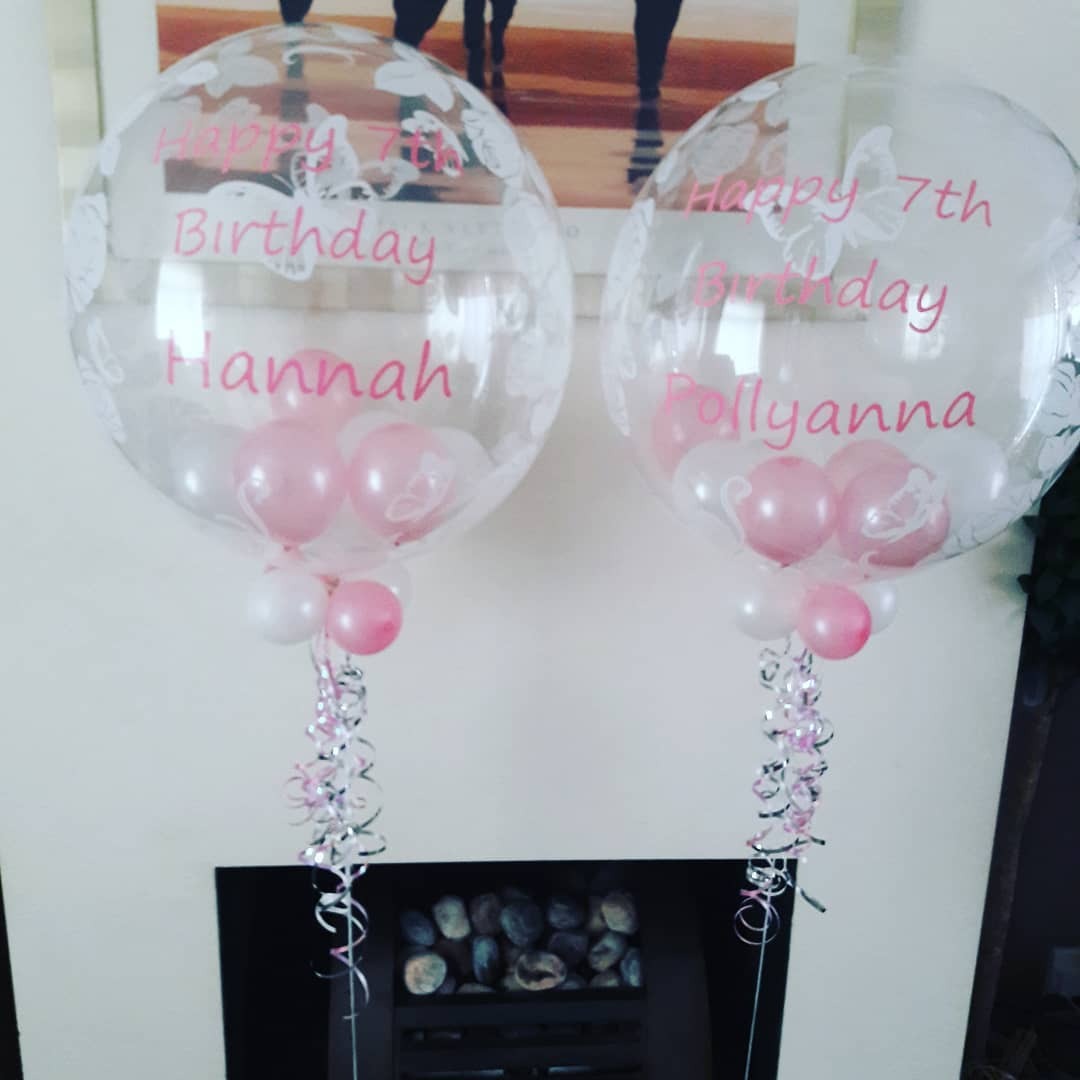 2 times personlaised butterfly print balloons with pink vynal lettering